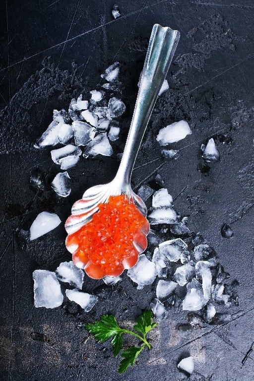 red salmon caviar, salmon caviar in metal spoons